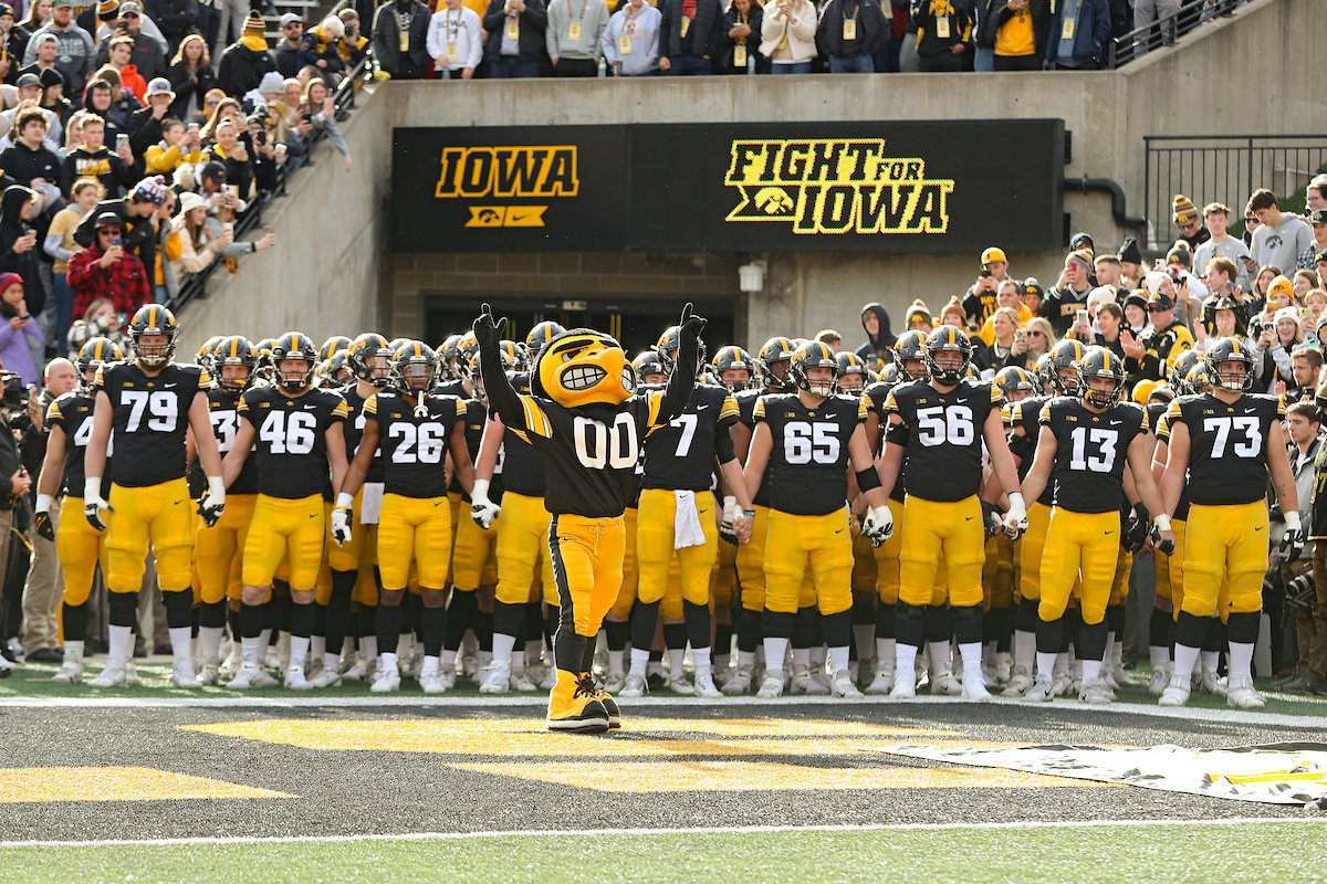 Iowa Football Team with Herky in front