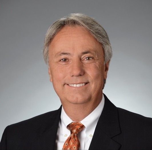 A headshot of George Hiller