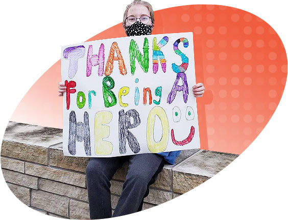 Girl with a thank you sign