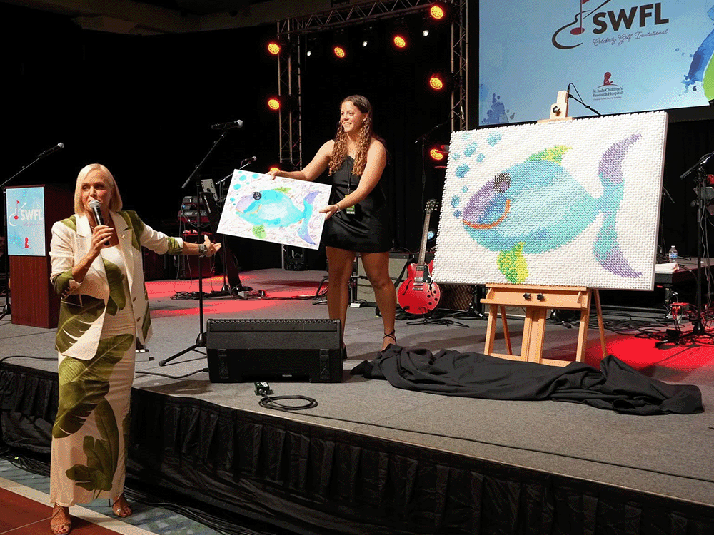 Kaitlyn with art she made